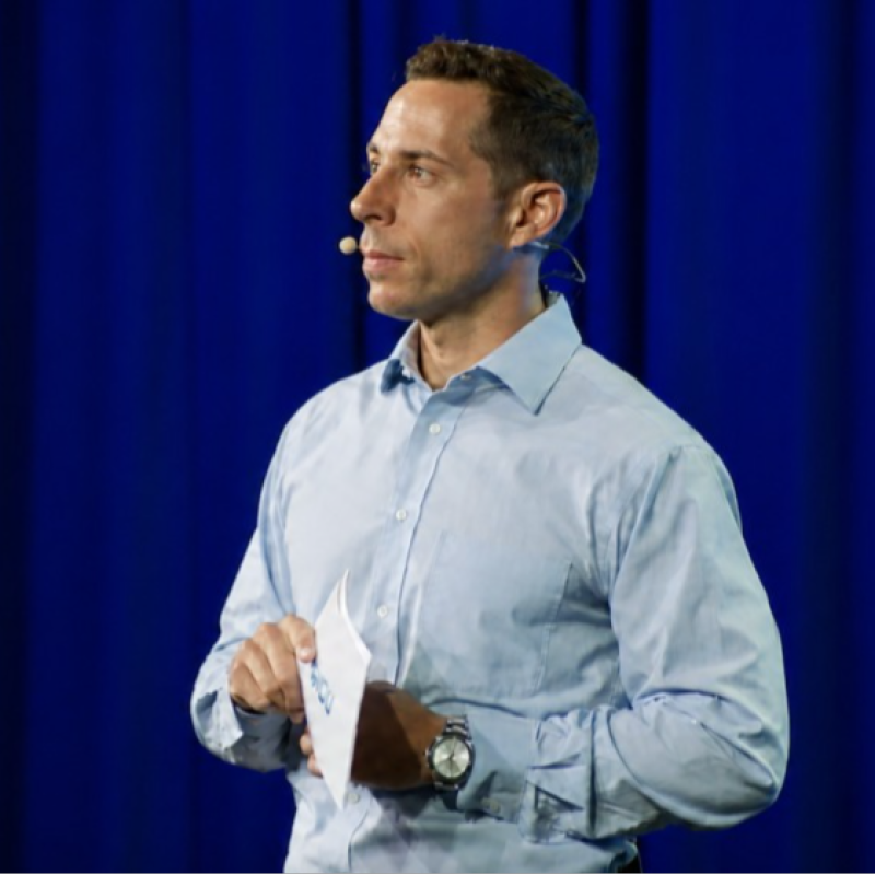 A.J. Merlino speaking onstage